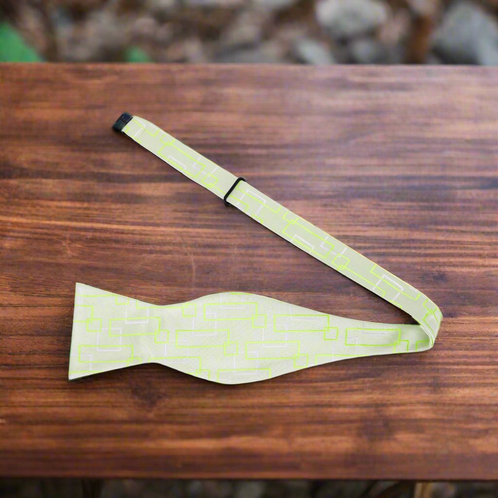 A Light Green Geometric Shapes Pattern Silk Self Tie Bow Tie Untied