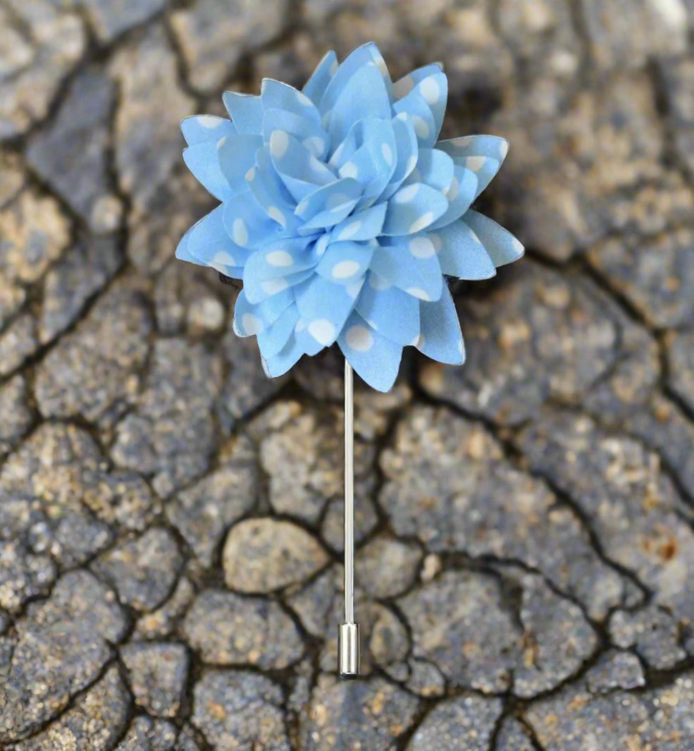 A Light Blue, White Polka Dot Lapel Flower||Light Blue, White