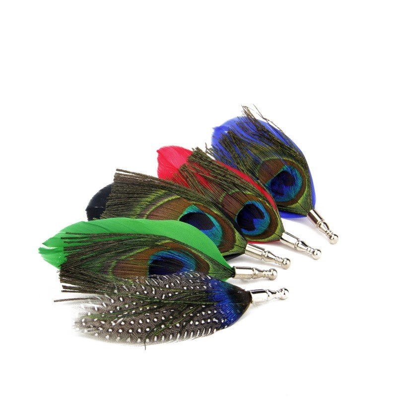 Multiple Peacock Feather Lapel Pins With White Background