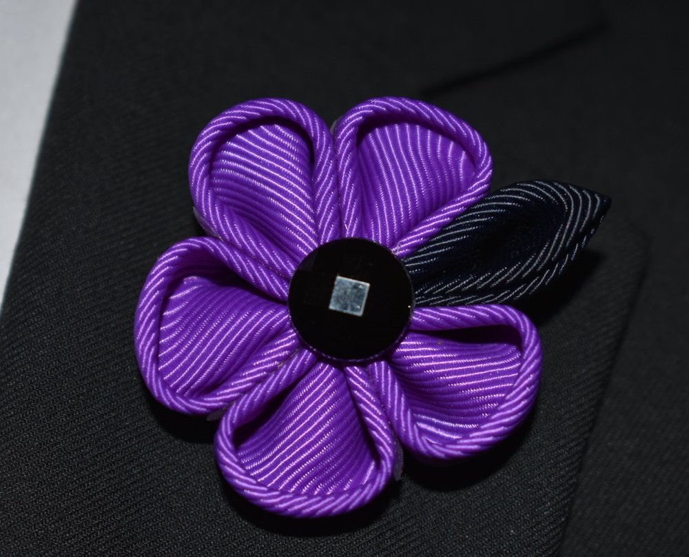 A Purple, Black Colored Thick Petal Lapel Flower||Purple, Black