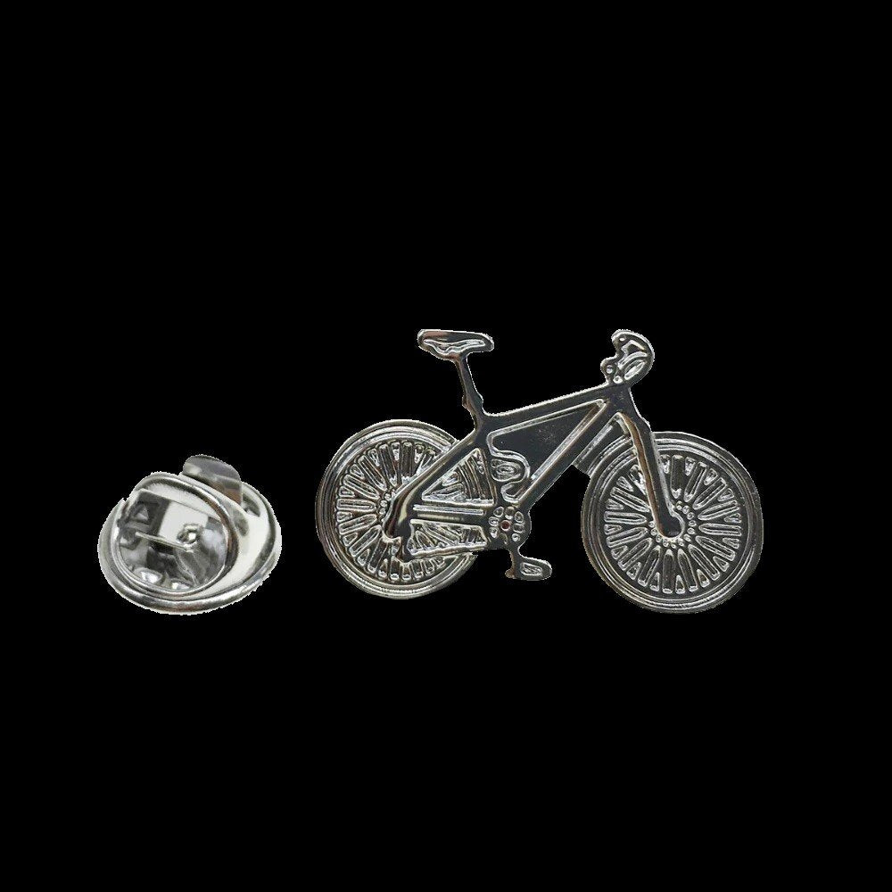 A Silver Colored Bike Shape Lapel Pin