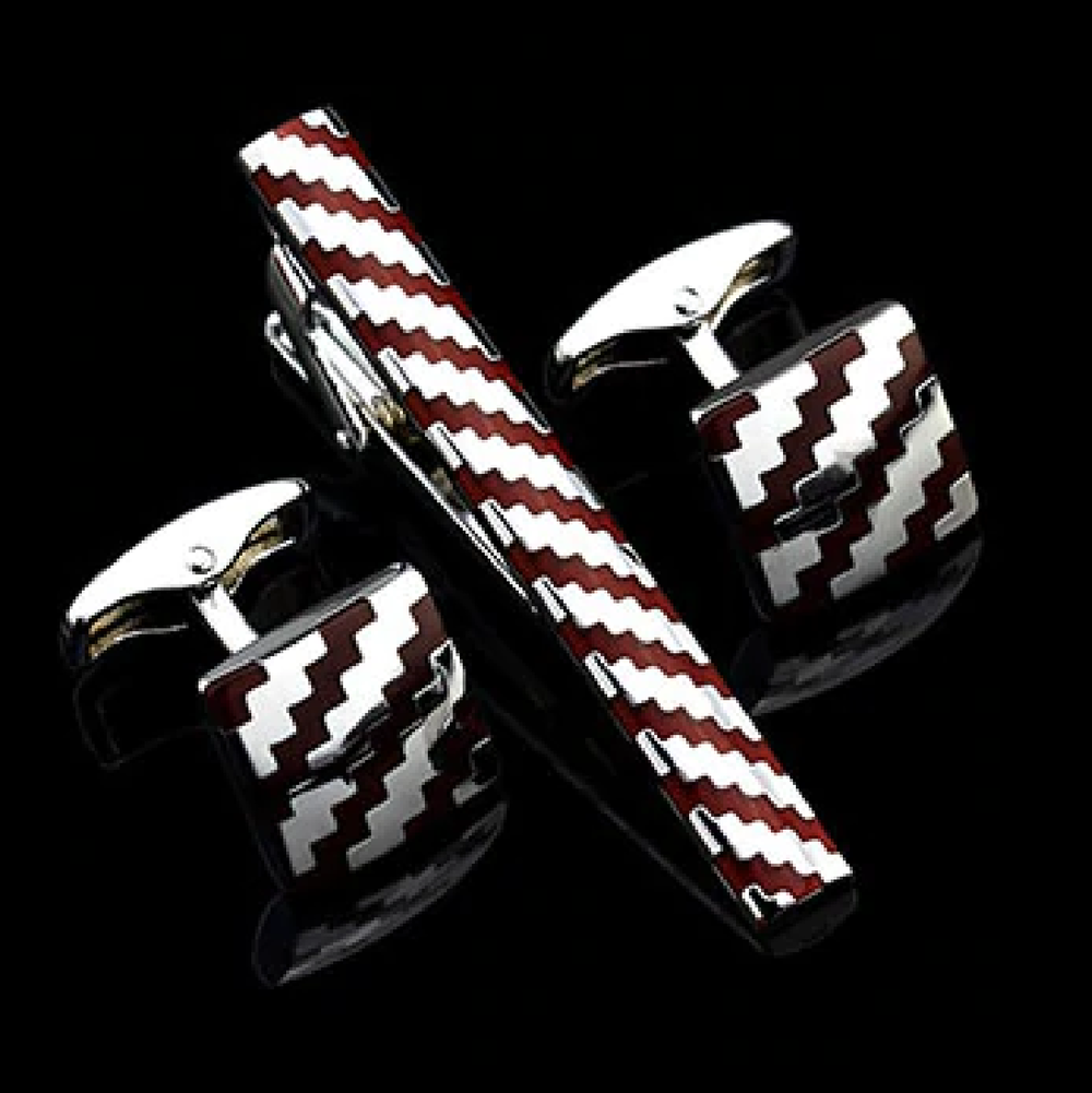 A Chrome, Mahogany Color Wavy Jagged Lines Tie Bar and Cuff-links Set.