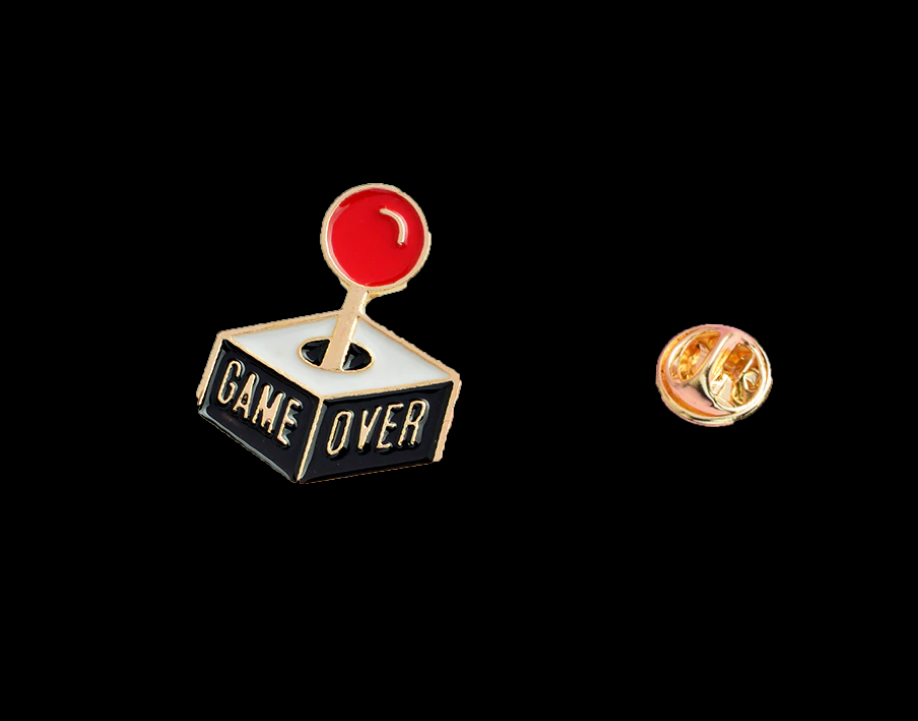 A joystick shaped lapel pin that says, "Game Over" on the side of the lapel pin