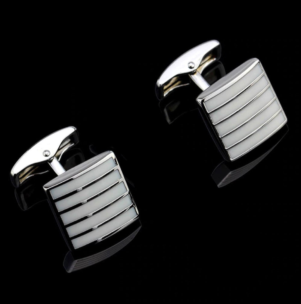 A Chrome, Pearl Lined Shaped Cuff-links