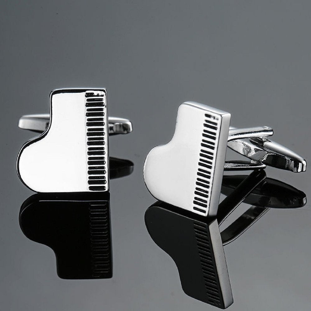 A Chrome and Black Piano Shape Cuff-links Set.