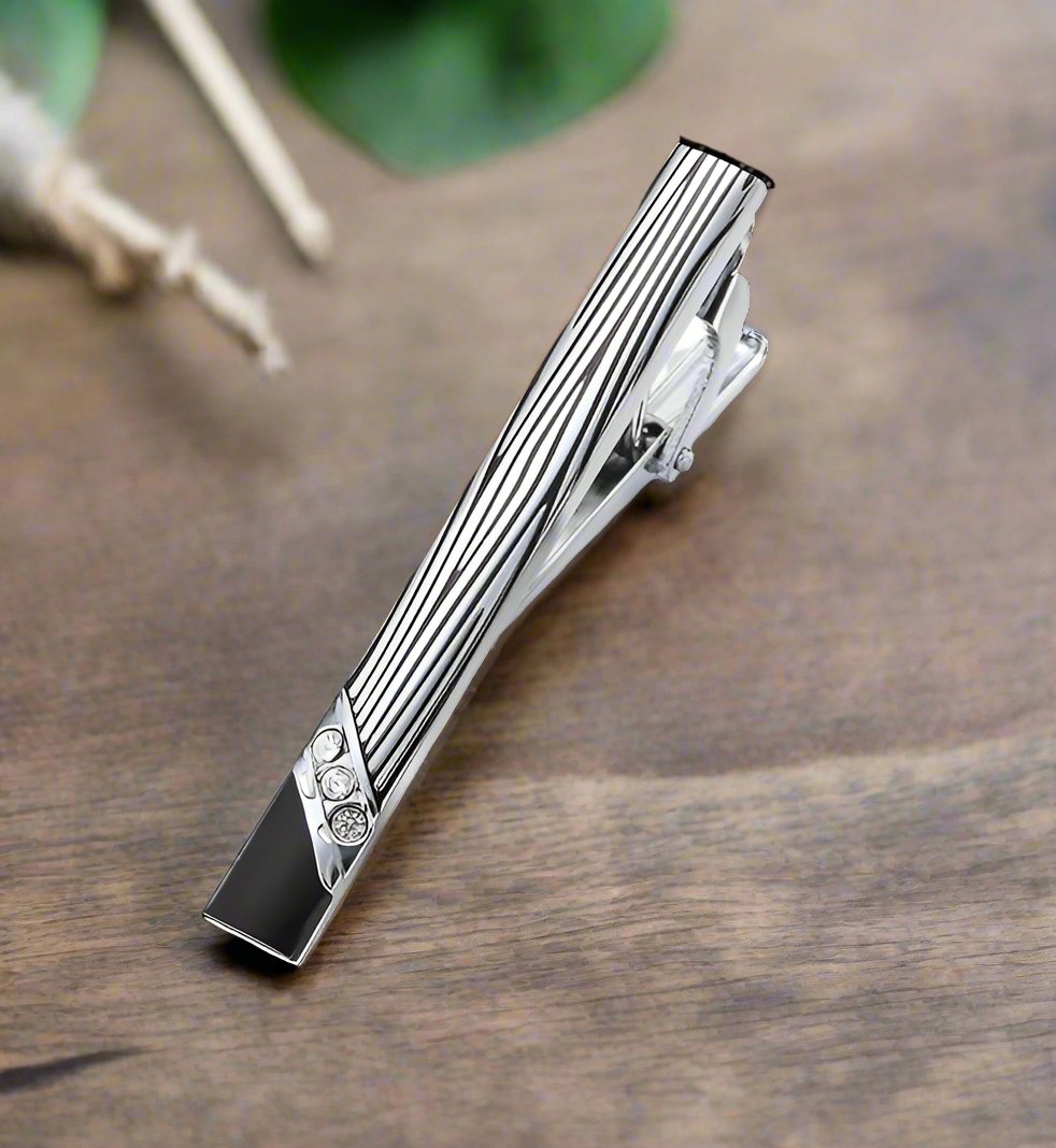 A Black, Chrome Rectangle Shape with Zebra Pattern and Stone Tie Bar